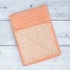 Zero twist dual layer 100 percent pure cotton bath towel neatly folded on a soft lifestyle background, showcasing plush texture and thickness