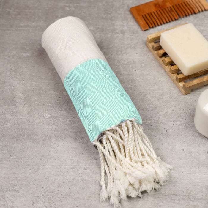 100% pure bamboo bath towel folded neatly on a modern lifestyle background, showcasing a soft Turkish-style weave