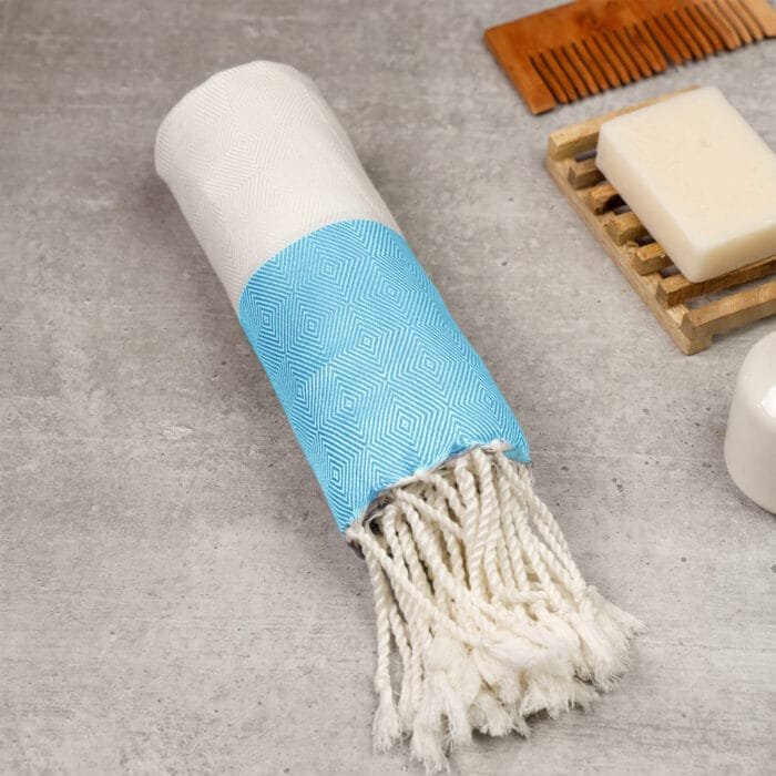 100% pure bamboo bath towel folded neatly on a modern lifestyle background, showcasing a soft Turkish-style weave