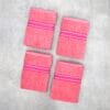 Pack of four 100% pure cotton terry hand towels with soft texture and high absorbency, suitable for bathroom and daily use.