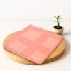 Folded bamboo pinstripe bath towel showing striped pattern and smooth finish