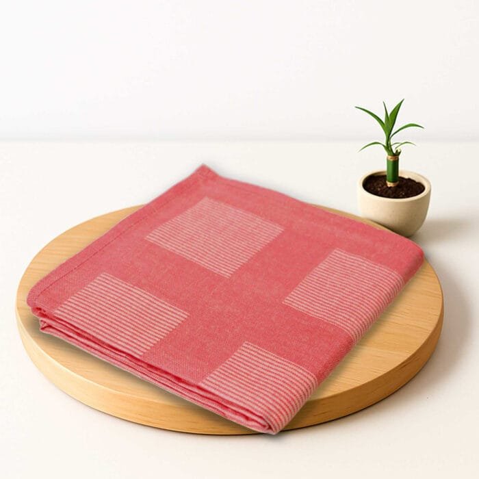 Folded bamboo pinstripe bath towel showing striped pattern and smooth finish